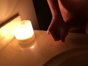 I masterbate by candlelight then cum on the counter