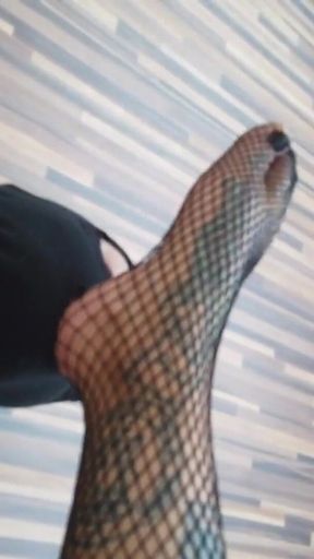 Blonde tattooed lady and her foot slave