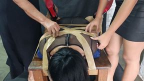 Woman bound completely with plastic tape to receive lots of tickling (2)