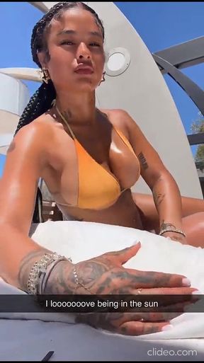Big-boobed natural beauty flaunts her tits