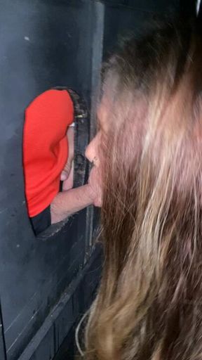 Gloryhole slut will suck any cock at the hole