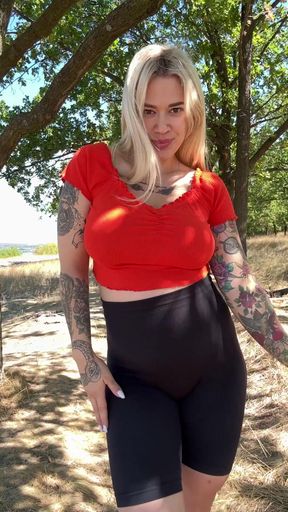 Pregnant babe shows off her big belly and tits in outdoor fun