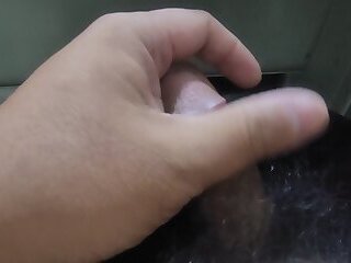 Playing with and stroking the penis