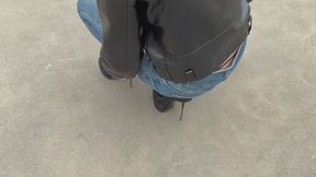 The girl was walking in very uncomfortable shoes and eventually fell and twisted her leg