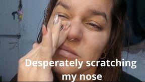 Desperately scratching my nose