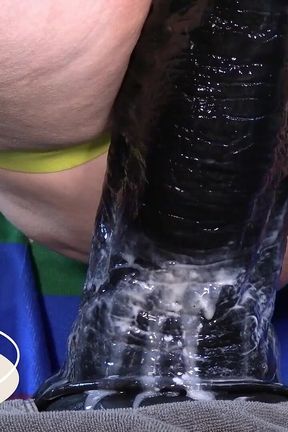 5 Minutes of a While Ride on This Huge Dildo with White Lube Showing How Deep