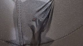 Wetting Grey Leggings on Wooden Stool