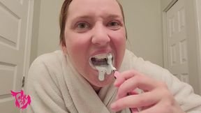 Brushing teeth in Bathrobe lots of suds and bubbles