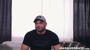 Brawny Jeremy moves his hand up and down while holding his dick