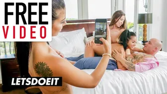 Horny brunettes seduce their tattooed stepdad into a wild foursome