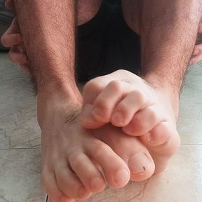 Hot guy massaging his feet. Foot fetish