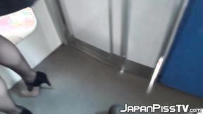 ”Japanese brunette  close up peeing in train”