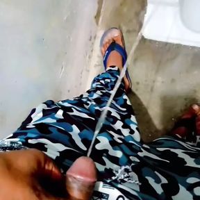 Desi teen indian boy peeing in public toilet