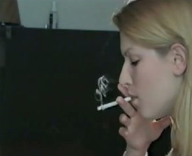 My delightful girlfriend looks hot smoking a cigarette