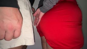 Big-assed Woman Touches the Erect Cock of a Stranger.