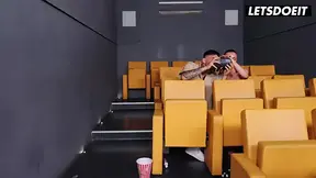 Tattooed MILF gets a standing fuck in movie theater