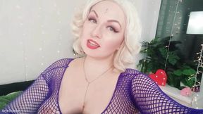Mistress in fishnet and leather instructs submissive to jerk off