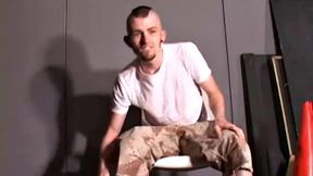 Nick Stevens with facial hair and piercings strokes cock to porn, keeps the t-shirt on