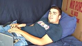 Young amateur Tony Hammer jerks off, breathes heavily, and sprays cum on his chest.