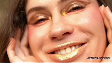Extremely Shiny Metallic Golden kiss Close up