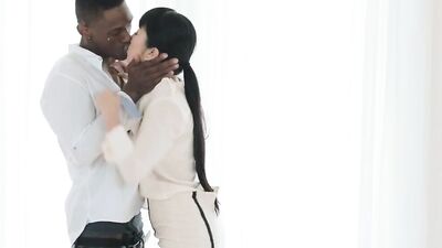 Petite Asian chick gags on a massive black dick and gets rammed