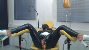 Enema in Latex Catsuit