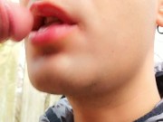 Licking last drops of cum from cock after getting facial outdoor