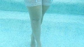 My shy voluptuous blonde MILF wife shows off her rack in pool