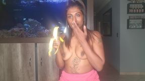 Topless Desi Squeezes Her Boobs as She Sucks and Deepthroats on a Banana