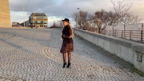 Sunset walk in high heels and fur coat