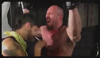 Muscle slave submits to dark basement electro torture with big cock