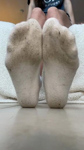 Filthy white sock removal