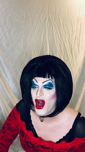 Captivating moment from "Sissy Slut in heavy makeup please cock on cam!"