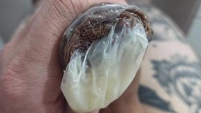 ANOTHER VIDEO FILLING THE CONDOM WITH SEMEN
