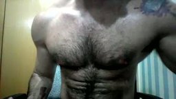 Hairy Tatted Hunk Jerking Off.