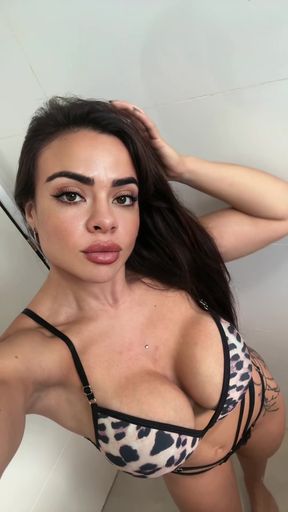 Sexy lingerie model in leopard print bikini