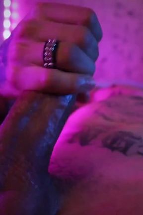 Hot Tattooed Twink Jerking His Big Uncut Cock with Oil and Shooting His Cum