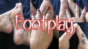 Footplay with red nails