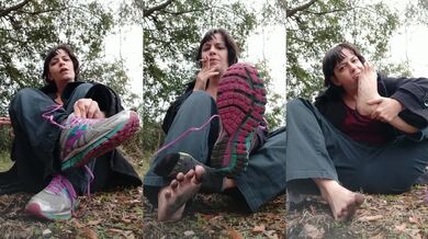 Licks sweaty feet in ash pit while taking off shoes and socks playfully