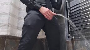 Skinny exhibitionist girl in elegant black dress jerks off with a big wet cock close-up