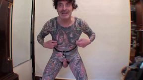 Strange old man in a wig playing around with his limpish cock