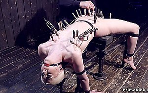 Blonde in device bondage ass hooked