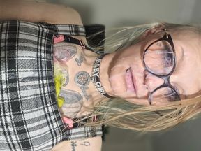 Trans slut playing with used condoms