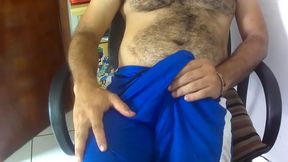 Guy Next Door Massages Dick in Blue Shorts for Sensual Relief