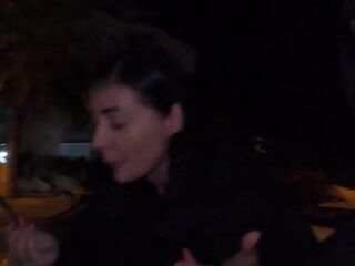 a hawt lady at night sexy and walking around the street