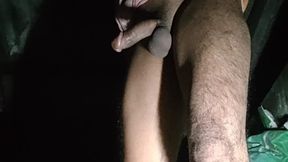 A Desi BBC boy is indulging in some late-night self-pleasure while watching porn. His dark skin glistens in the glow of the scre