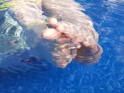 MILF Mistress Vixie's Soles And Toes In The Pool.