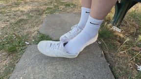 Shoeplay in Nike Air AF1 Sneakers at the park
