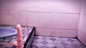 Newbie femboy secretly uses sex toy in the bathroom.