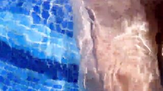 Huge breasts bimbo give amazing hand job into hotel pool -